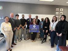 Group photo at Harrisonburg High School with VCAC adviser Rosie Chisolm and Virginia Delegate Tony Wilt.